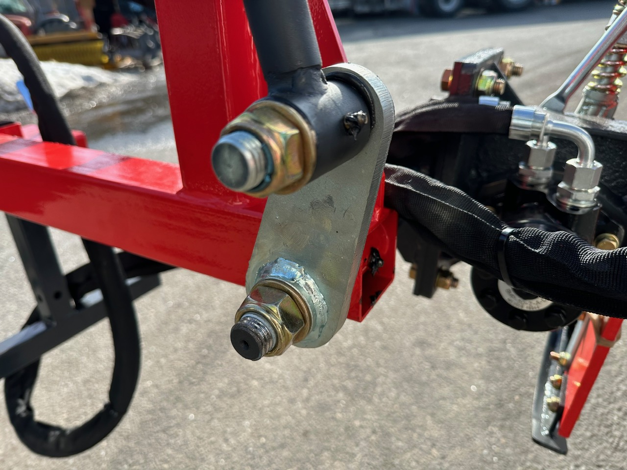 Hydraulikcylinder og flowregulatormontage